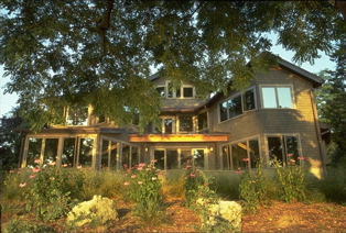 East view of house with ornamental grasses and wildflowers